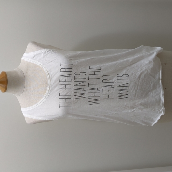 Talula Aritzia white tank distress look 'The heart wants what the heart wants'